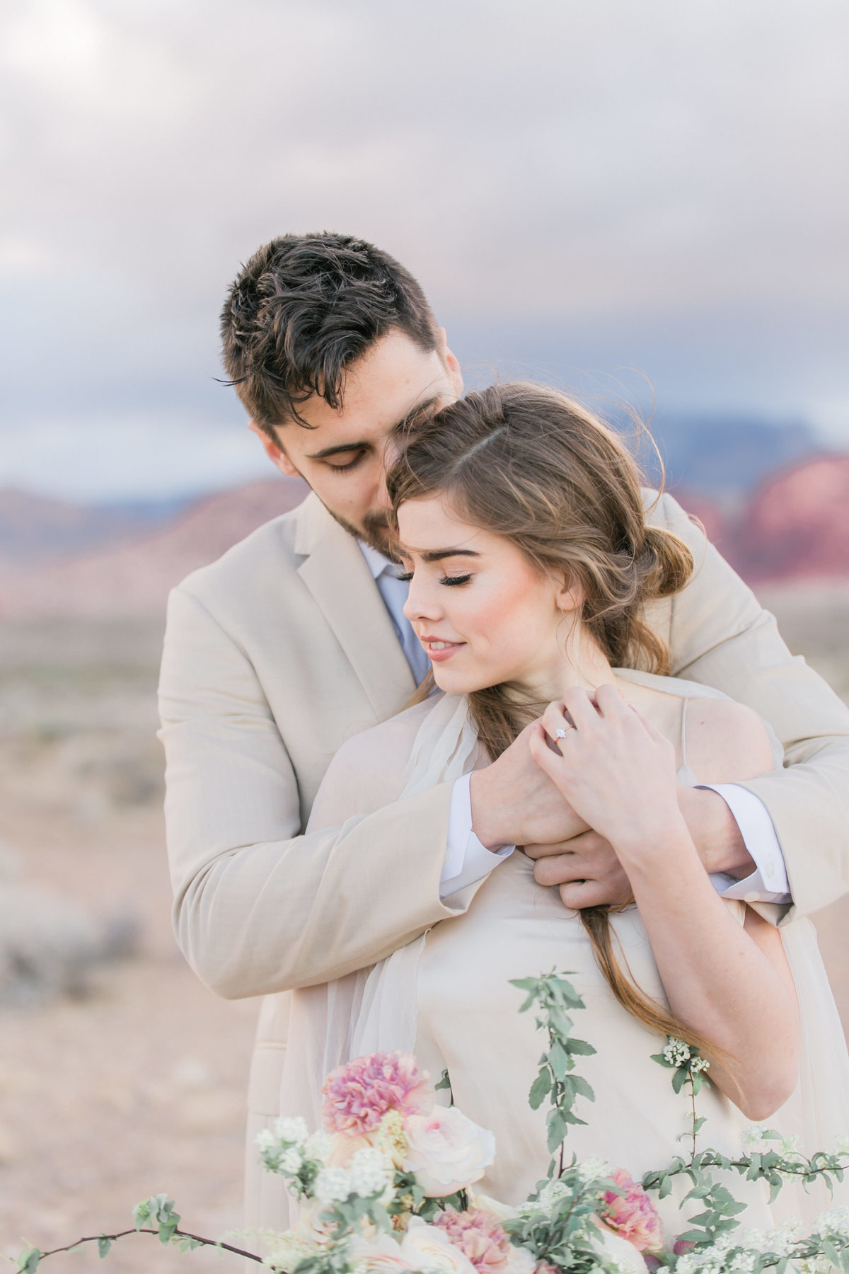 bride and groom at red rock