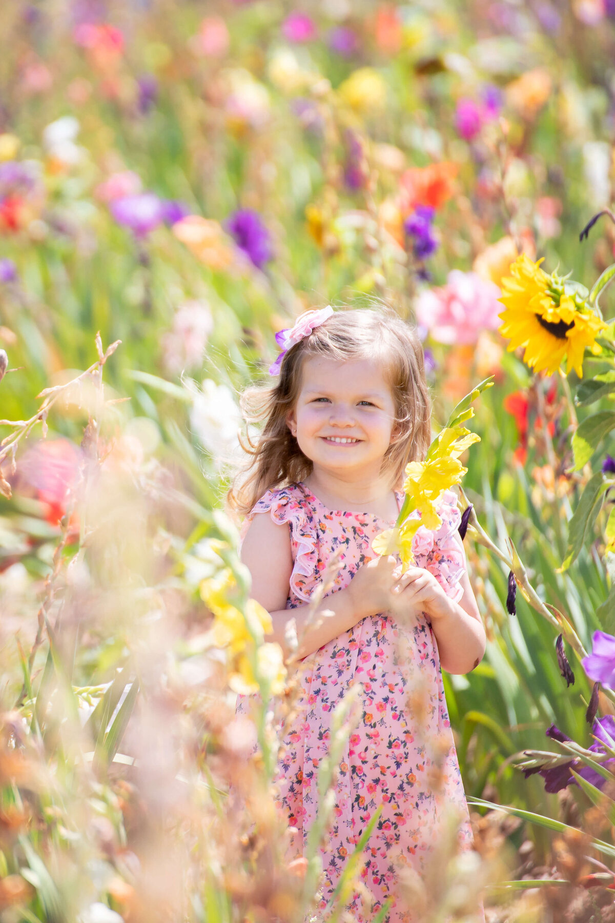 My daughter surrounded by a beautiful field of flowers in Germany.