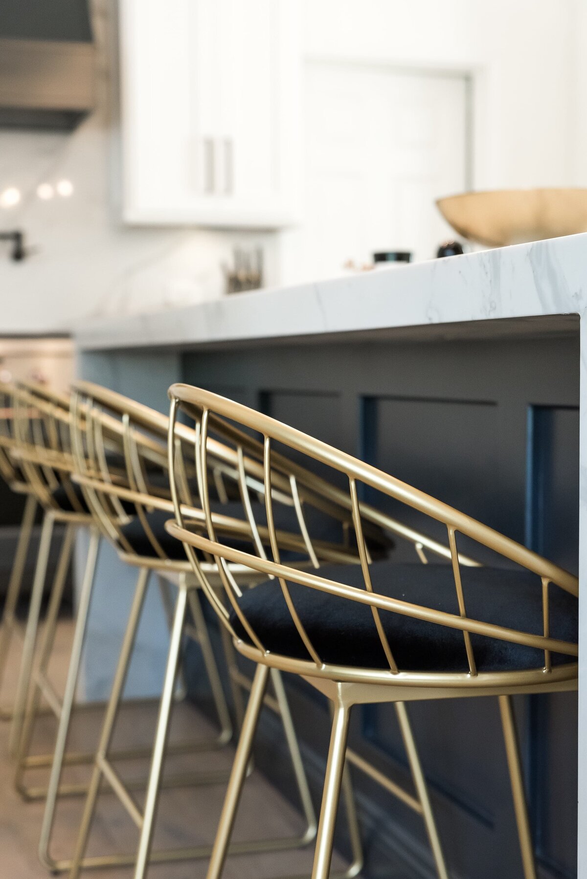 dewine design orlando interior designer modern lakehouse gold wire barstools with back cushion