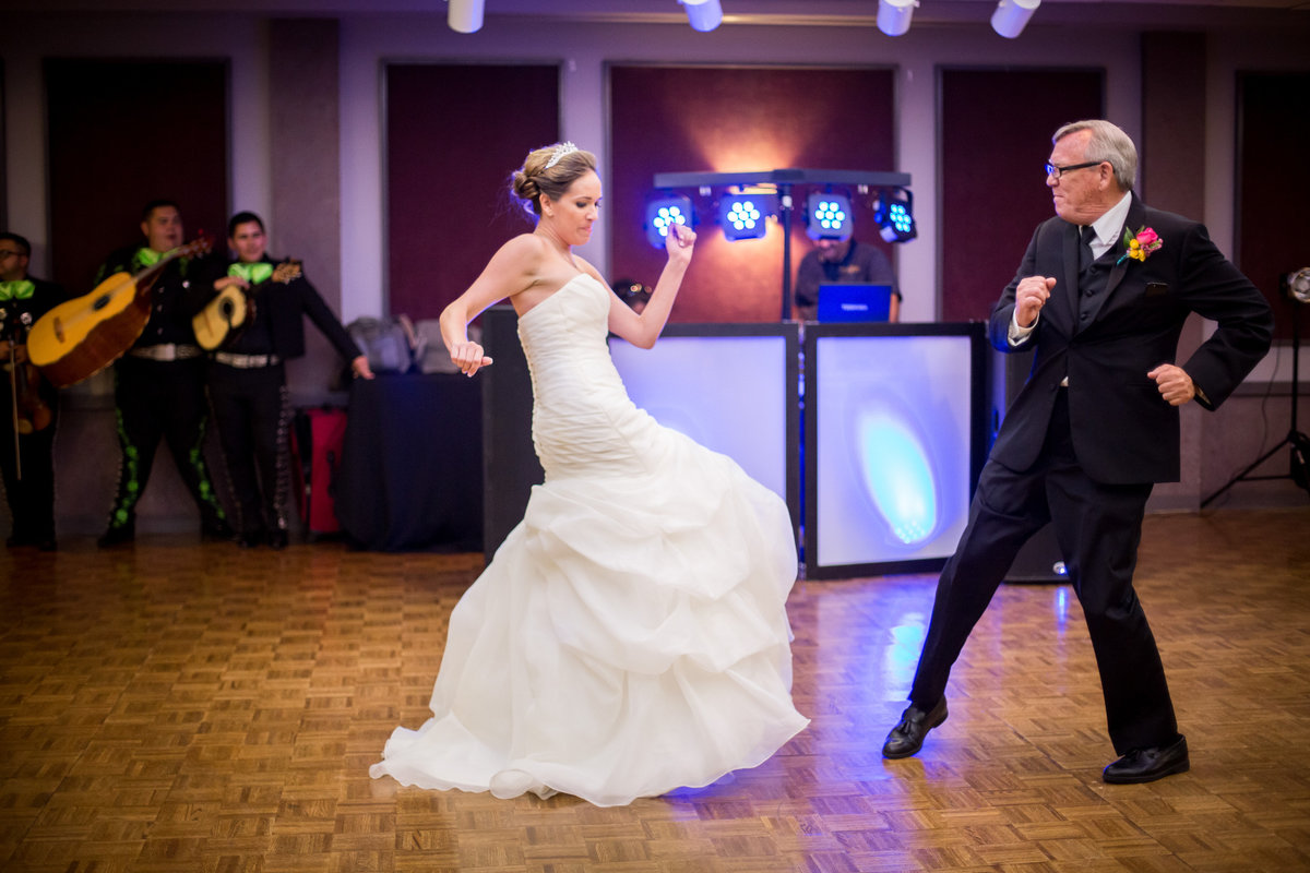 Father and daughter really getting down at their father daughter  dance at Holy Spirit Church in San Antonio