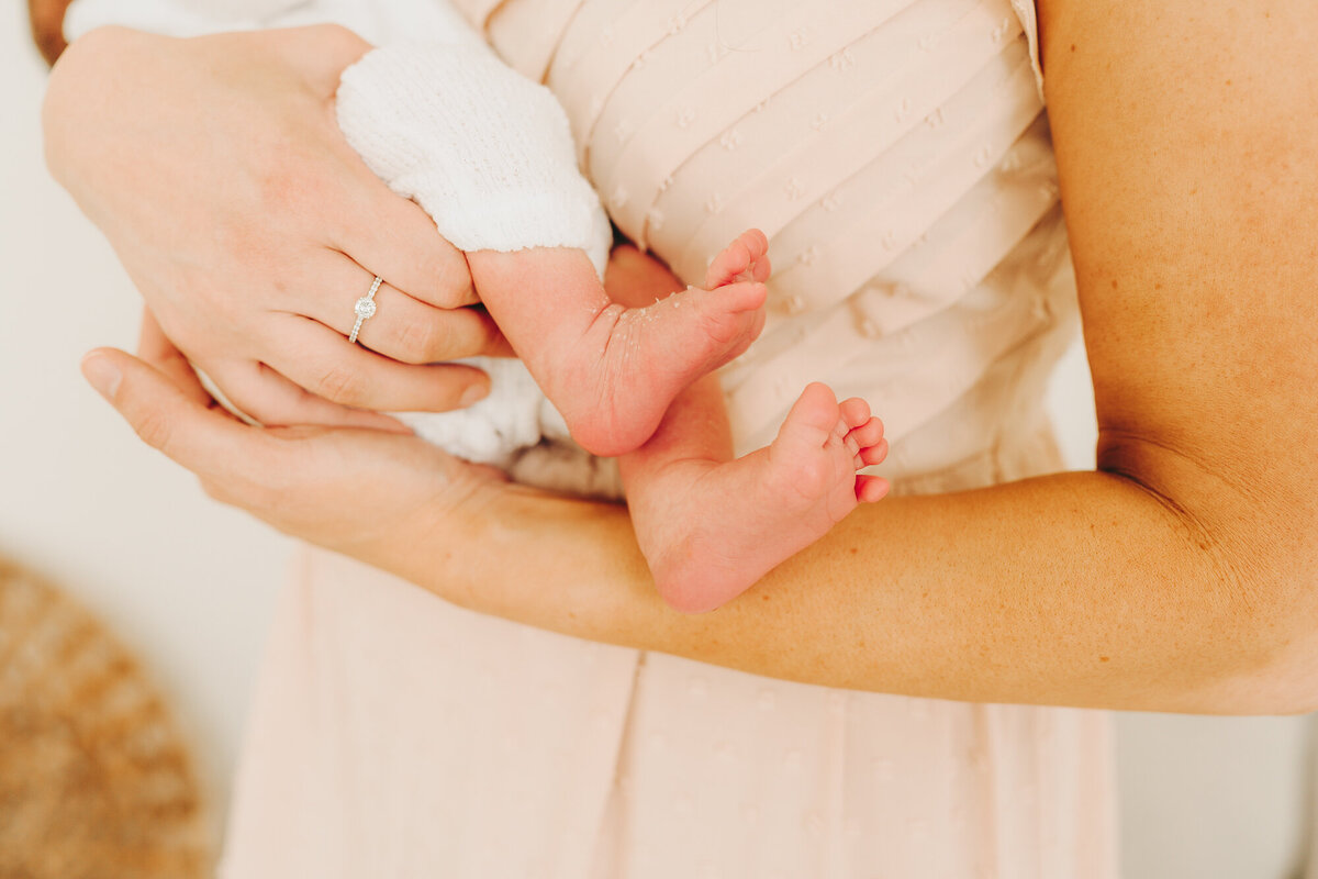 detail shot of baby's feet during newborn session in jackson missouri