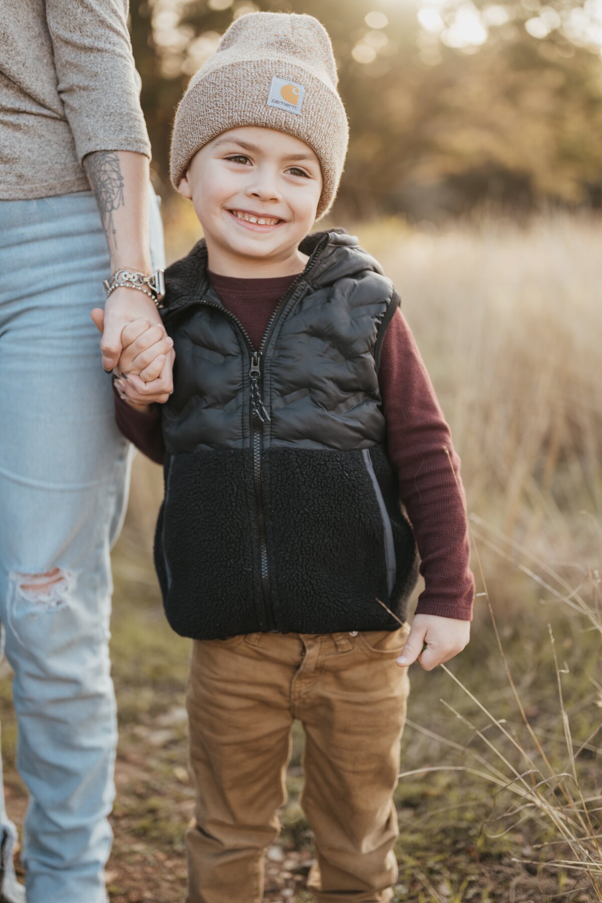 son-holding-mom-hand