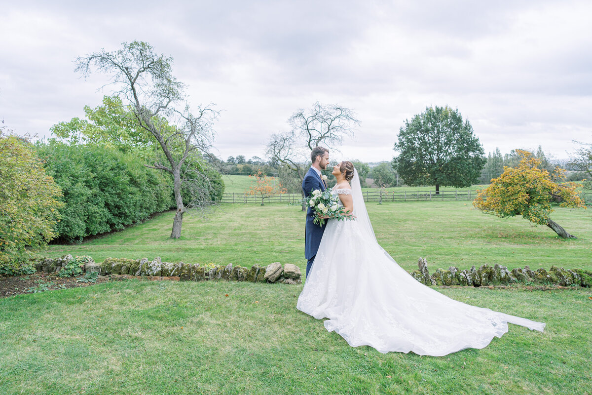 Portrait of bride and groom at countryside wedding in the Midlands