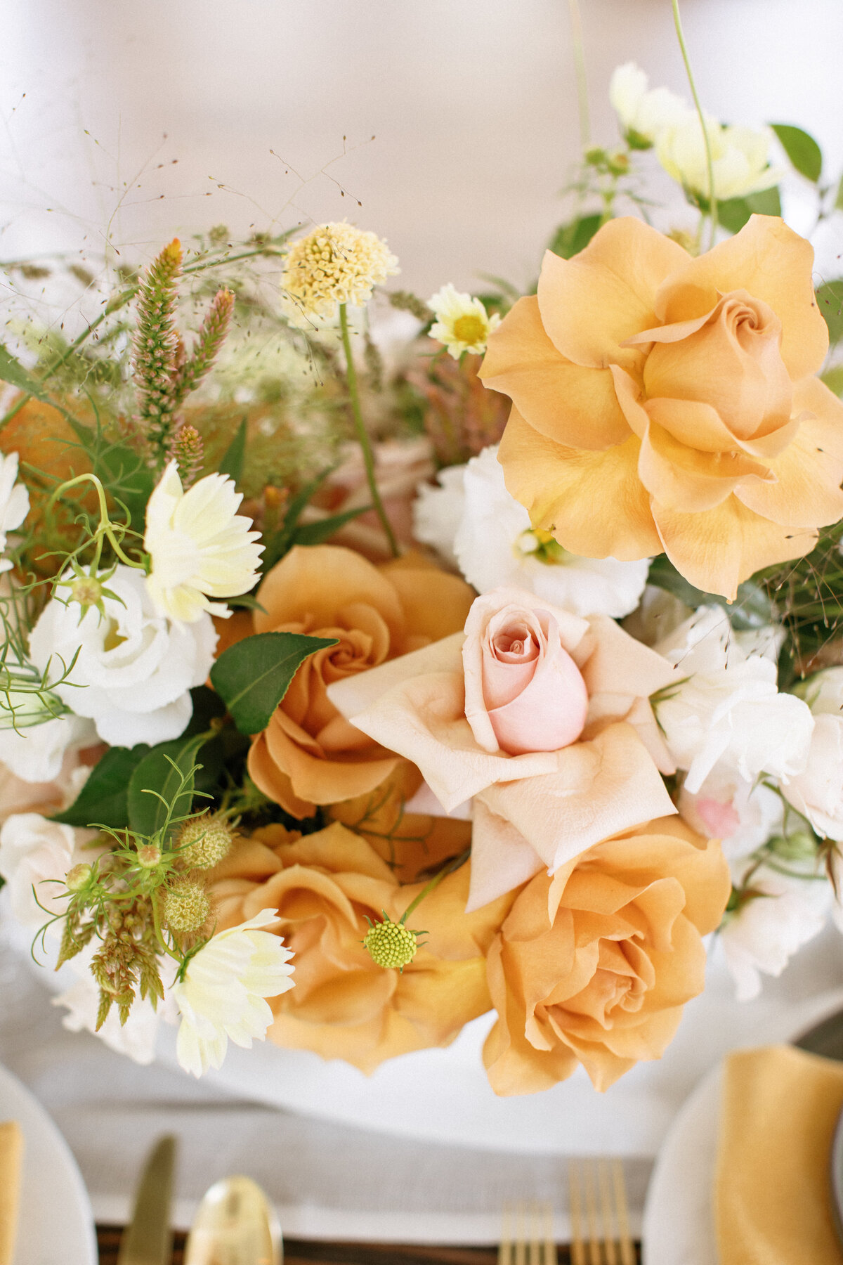 Green, gold and pink romantic wedding floral centerpiece