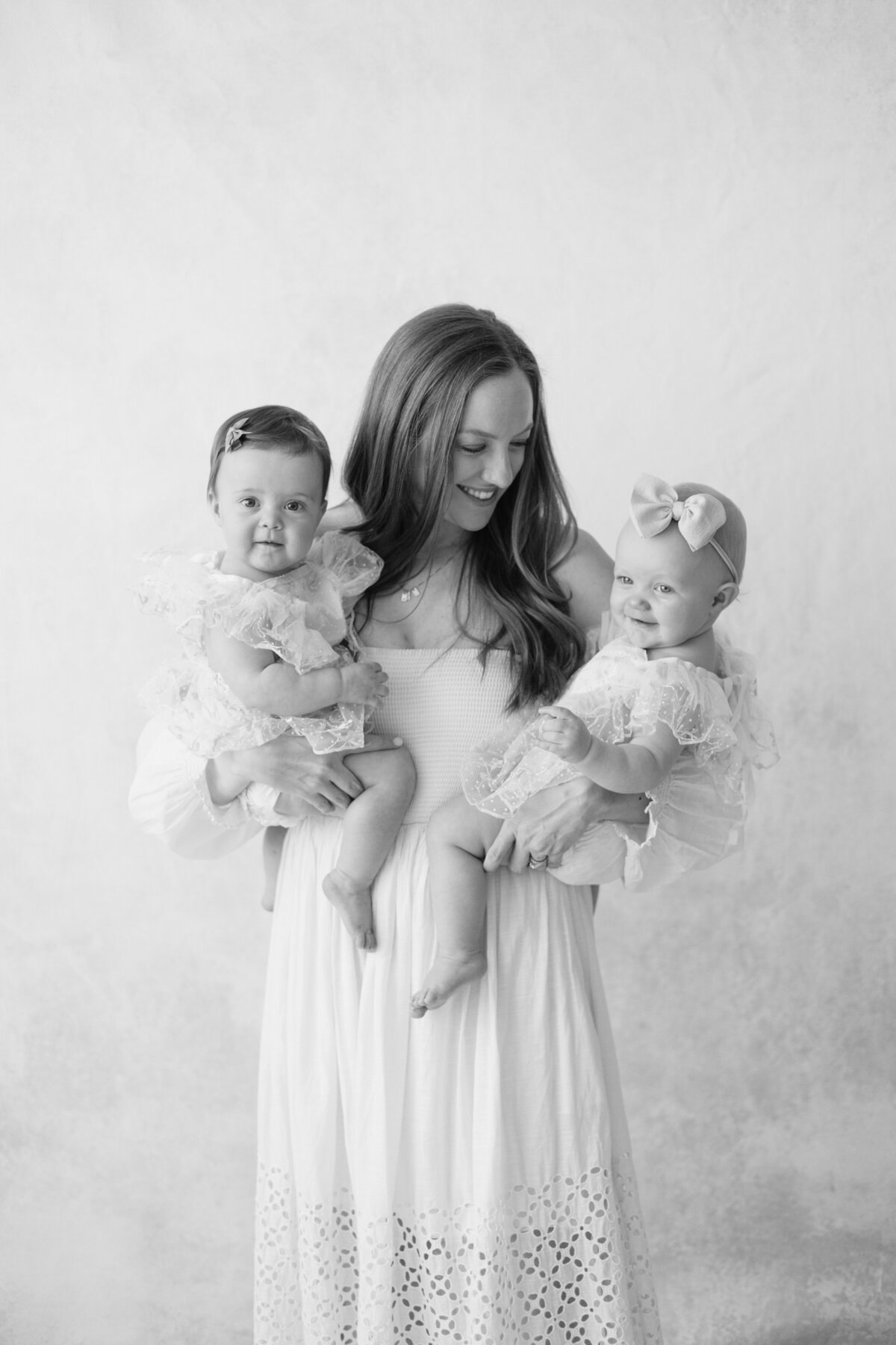 Studio family session for twin one year old daughters located in Lewisville, TX