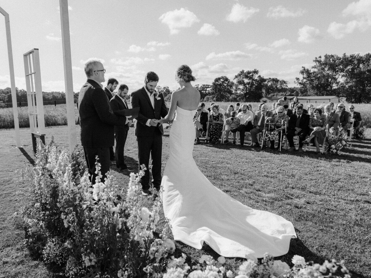 black and white candid ceremony moment