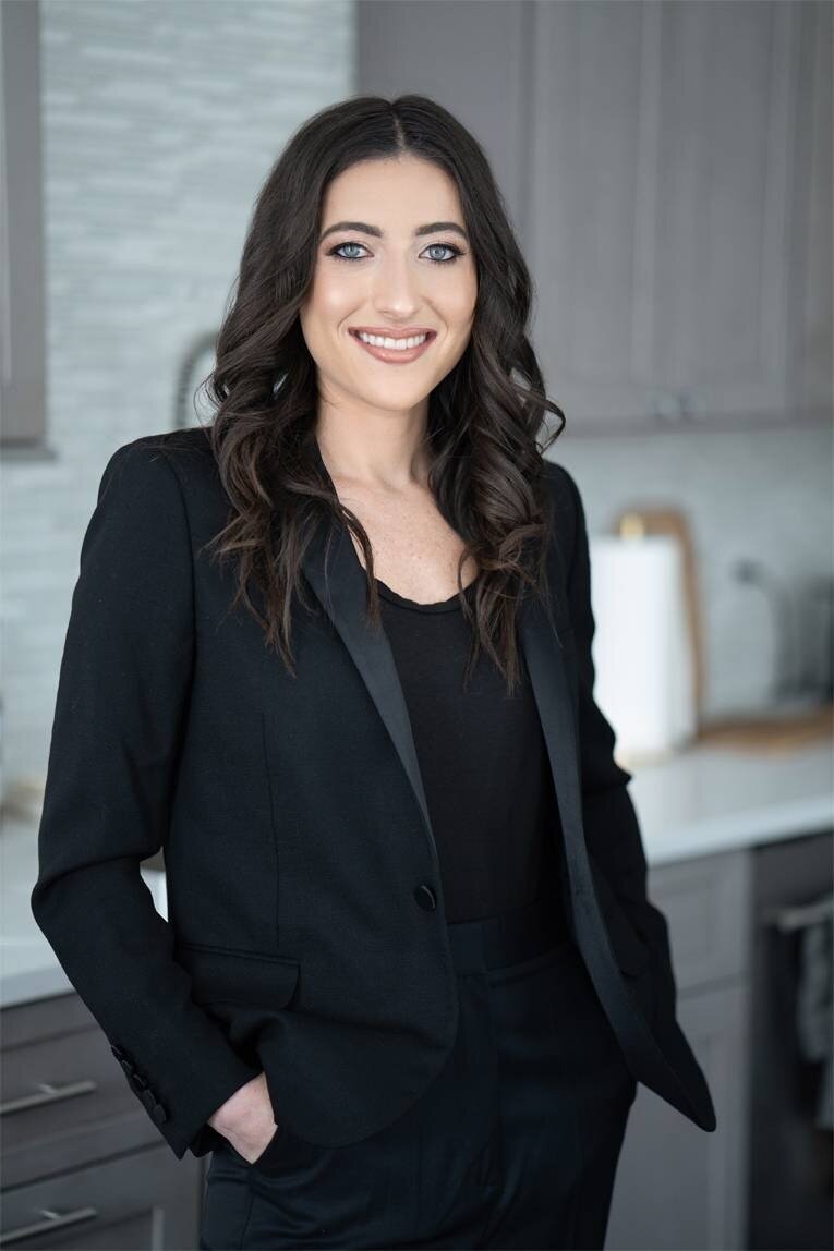 Professional NJ corporate headshot of confident businesswoman in Bergen County office