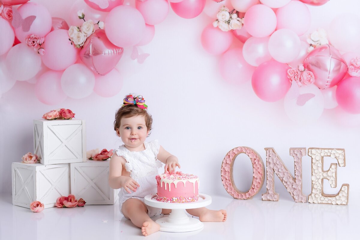 one year old pink flowers photoshoot