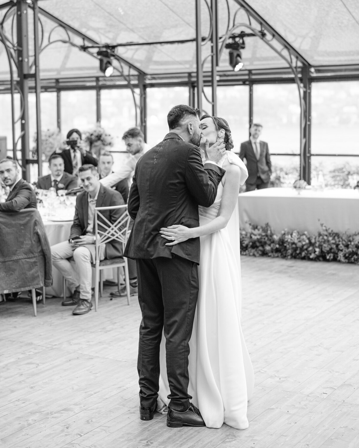 Bride and groom kissing on the dance floor at Lake Como wedding