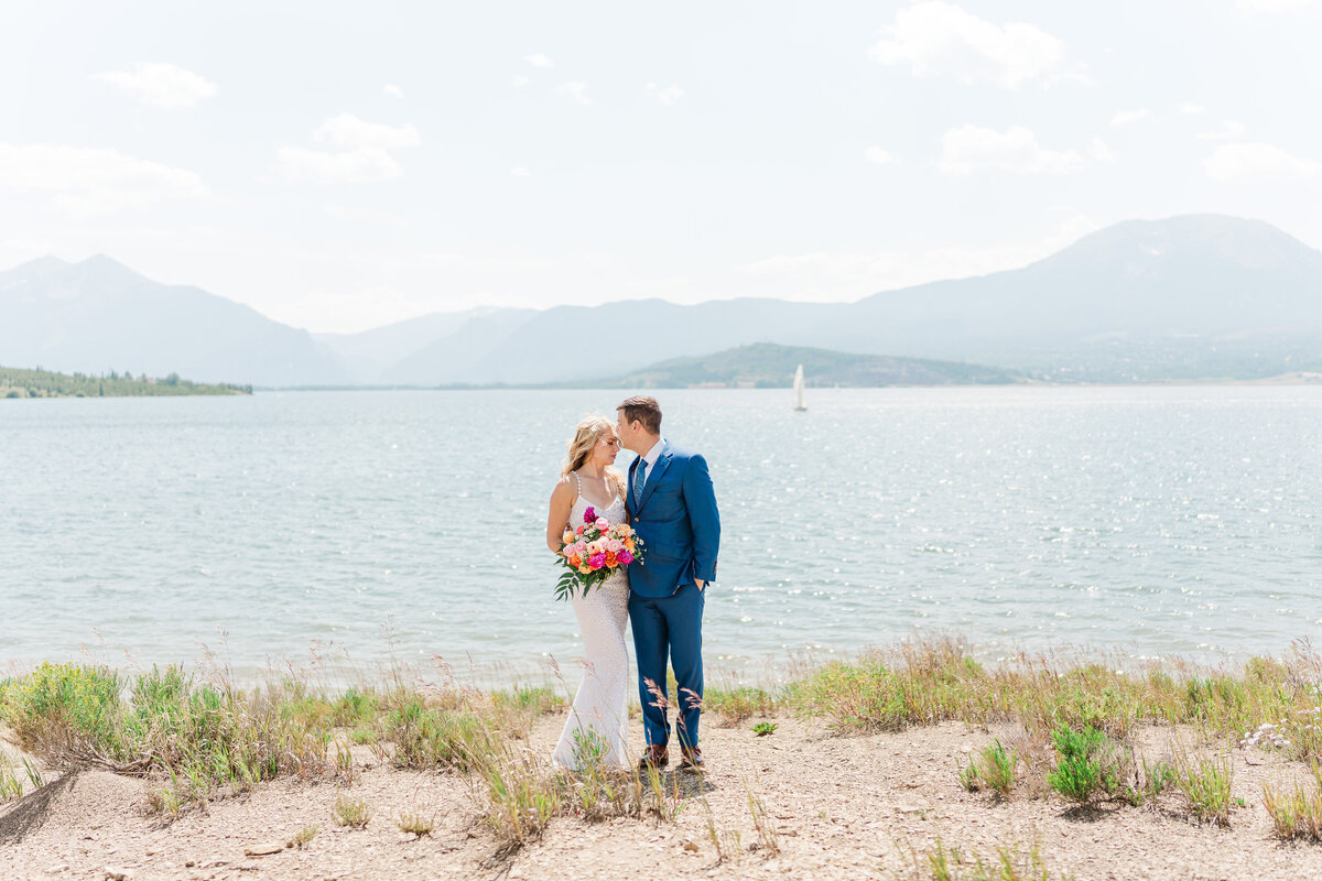 Lake Dillion Reservoir Colorado Elopement Wedding Mountain View Summer Pink and Orange Florals Sparkly Dress Light and Airy Elena Spraguer Photography0091