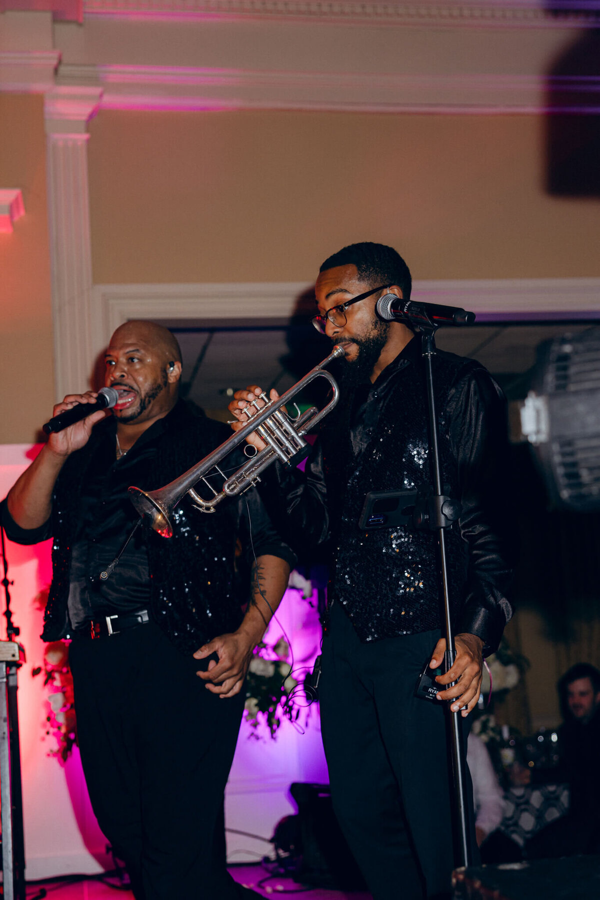 A wedding photo of the band during the wedding reception