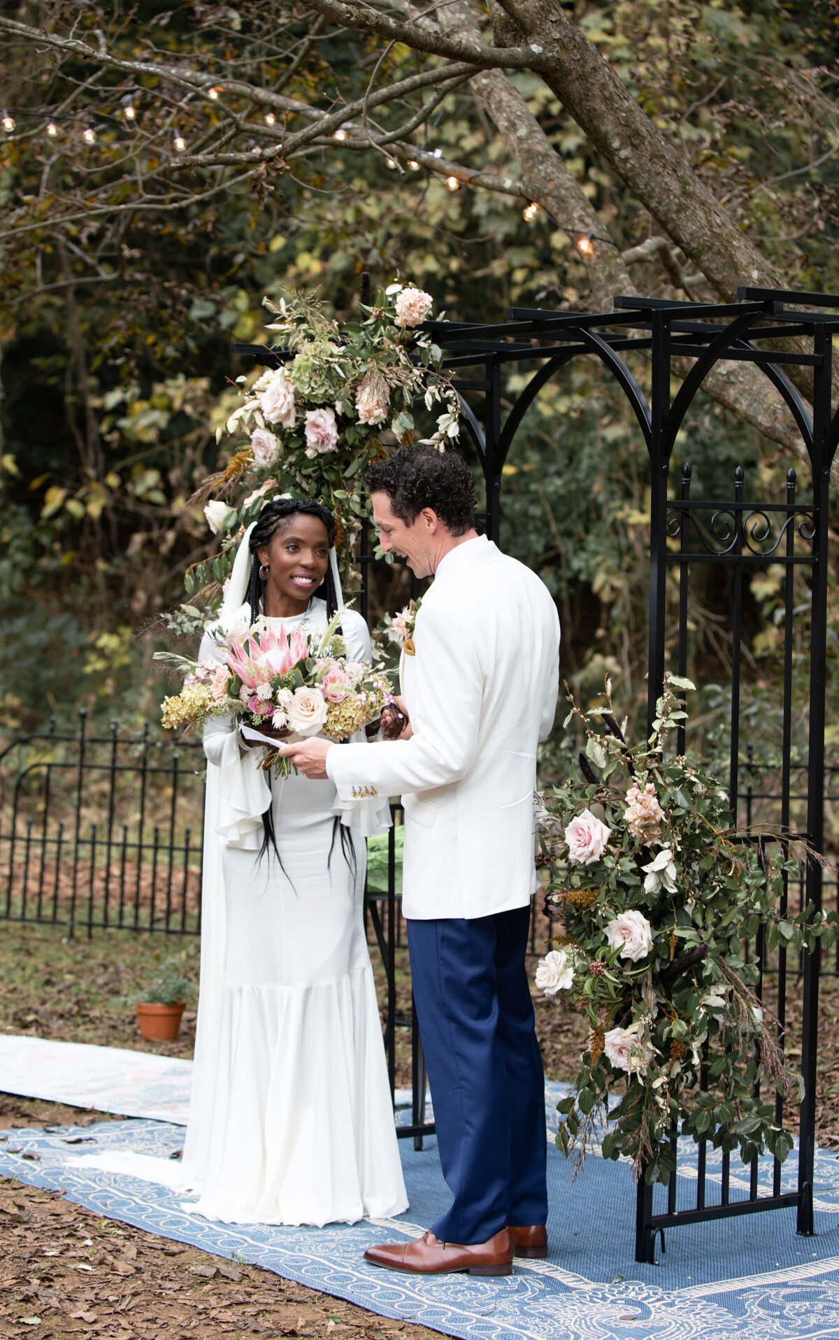 Atlanta-Editorial-Wedding-Photographer-Outdoor-Ceremony-Black-Bride-White-Groom-Flower-Arch