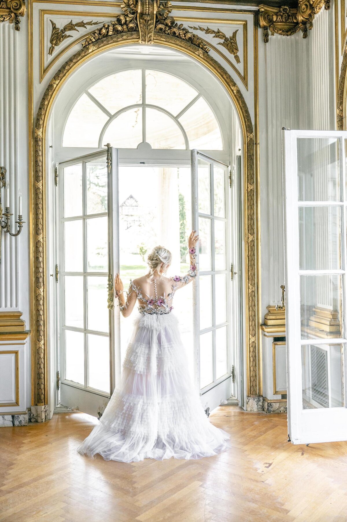 Bride opening french doors