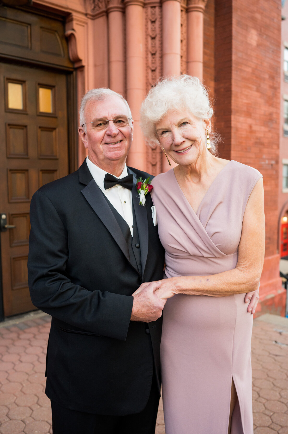grandparents smiling for photos on wedding day