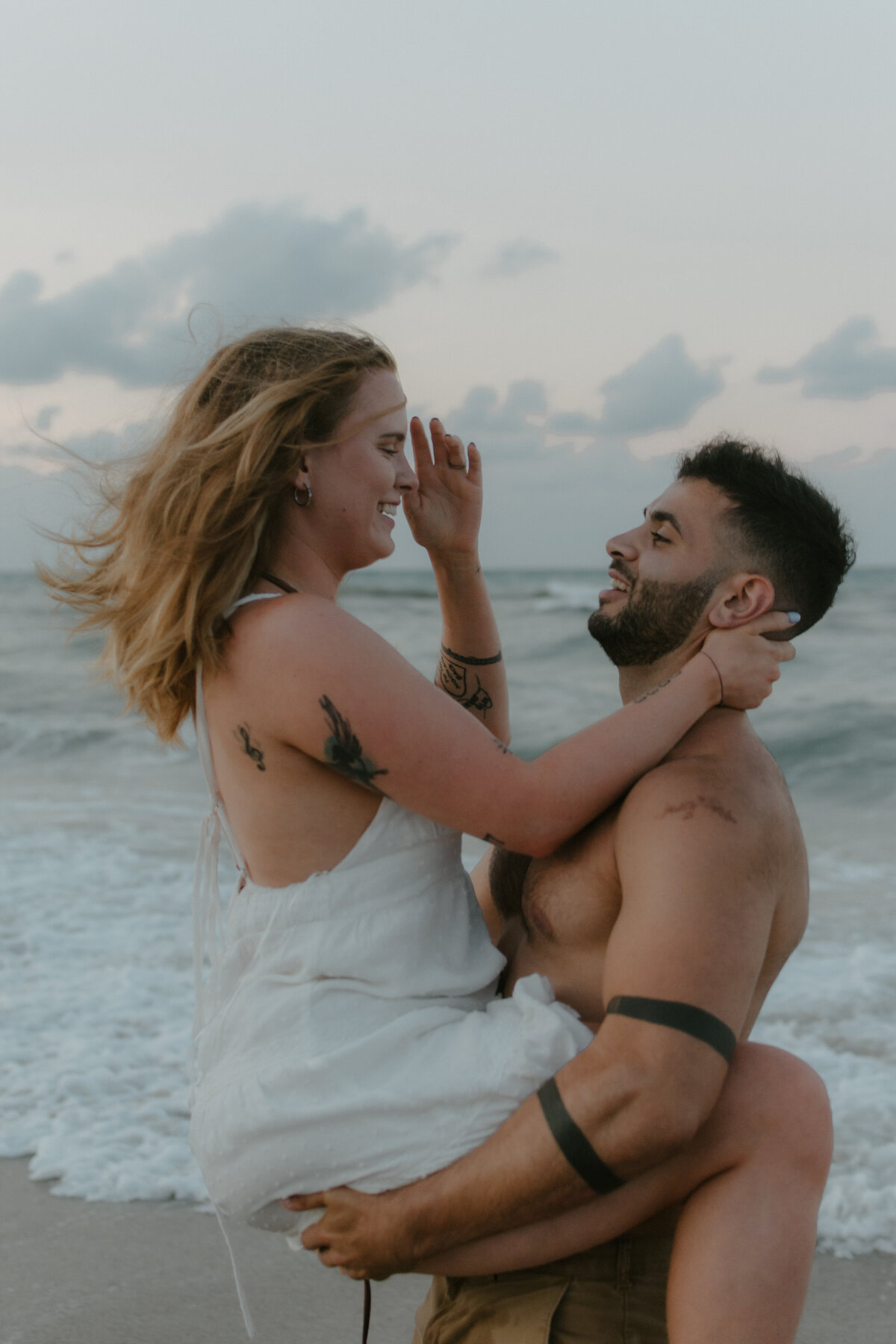 fun beach engagement session