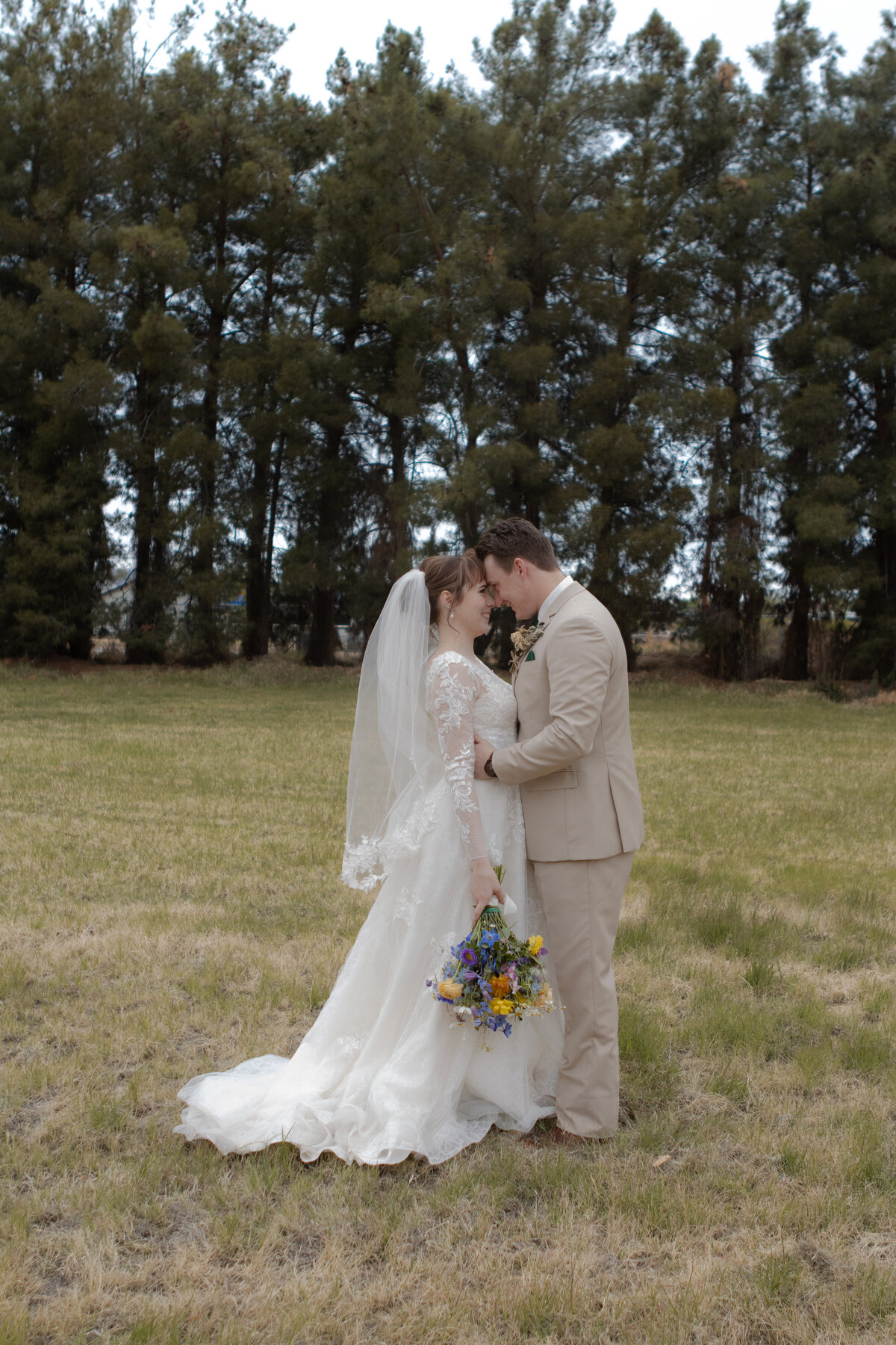 Jovanna G Photography. Classic, sophisticated Wedding Photos. Soft romantic engagement photos. Soft romantic WeddingPhotos. Sophisticated Wedding Photographer. Professional Wedding Photographer. Destination Wedding Photographer. Luxury Wedding photographer. Traveling Wedding Photographer. AZ Wedding Photographer. Gilbert AZ Wedding Photographer. Queen Creek Wedding Photographer. Phoenix Wedding Photographer. Scottsdale Wedding Photographer. Flagstaff Wedding Photographer. SoCal Wedding Photographer. California Wedding Photographer. Northern California Wedding Photographer. Southern California Wedding Photographer. San Francisco Wedding Photographer. Bay Area Wedding Photographer. San Jose Wedding Photographer. Golden Gate Bridge Wedding Photographer. Beach Lover Wedding Photographer. Palace of the Fine Arts Wedding Photographer. Ocean Lover. I love California. Orange County Wedding Photographer. Newport Beach Couples Photographer. Newport Beach Wedding Photographer. Laguna Beach Couples Beach Engagement Photographer. Laguna Beach wedding beach photographer. Los Angeles Wedding Photographer. Young and in love engaged couples who live in southern California. Christian Young Couple. Young Engaged Couple. Engaged High School Christian Couple. Christian Values. Young conservative Christian women. Young Conservative Christian men. Young Conservative Christian Couple. Young Christian Couple Engaged in High School. Young Christian College Couple. Forest, Flora Wedding for the Fergusons. Arizona Flagstaff Wedding. Arizona Flagstaff Wedding Cloudy, Rainy day. Detail Flatlays. Details Checklist. Vow books. Ring box. Jewelry. Florals. Groom’s Details. Hunter and Julia Forest pine tree wedding. Pine Top Cloudy Rainy day Wedding day. Pine tree mountain wedding. California pine mountain tree wedding day. Outdoor rainy day wedding in the mountains. Mountain top pine tree outdoor spring wedding. Green bridesmaids dresses. Fun wedding party. Venue at Schnepf Farms. Wild Blume Florals. Makeup by Laly Harr. David’s Bridal. Womack Services AZ. Inspired Sugar Cake.