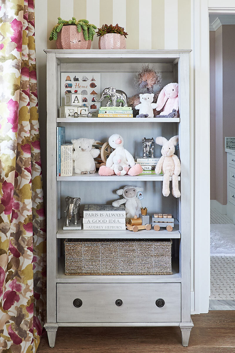 Baby nursery shelf styling