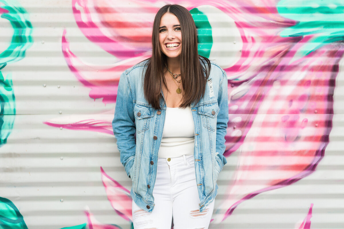 high school senior girl poses for senior photography session