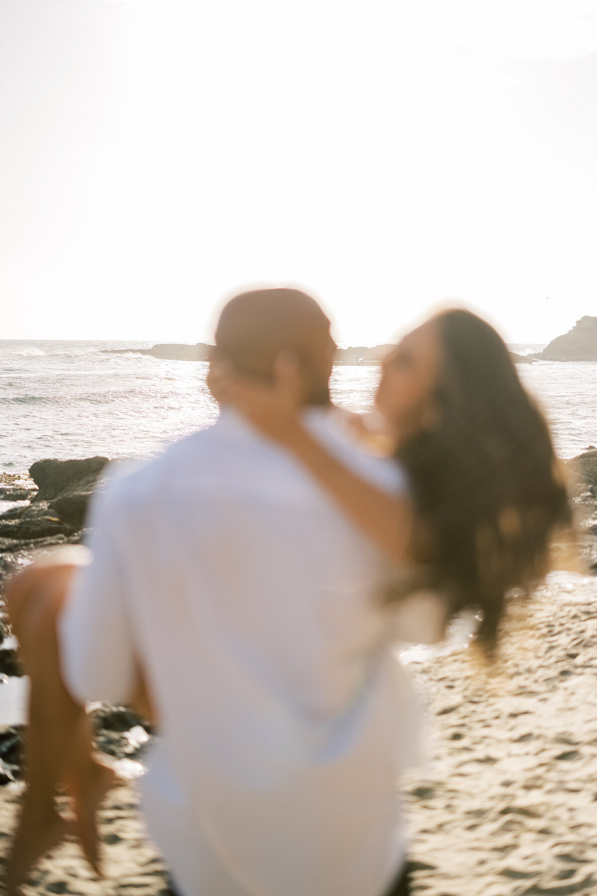 moody and carefree engagement beach photo