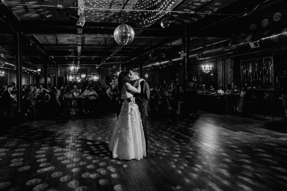 A black and white first dance photo at Salvage One in Chicago