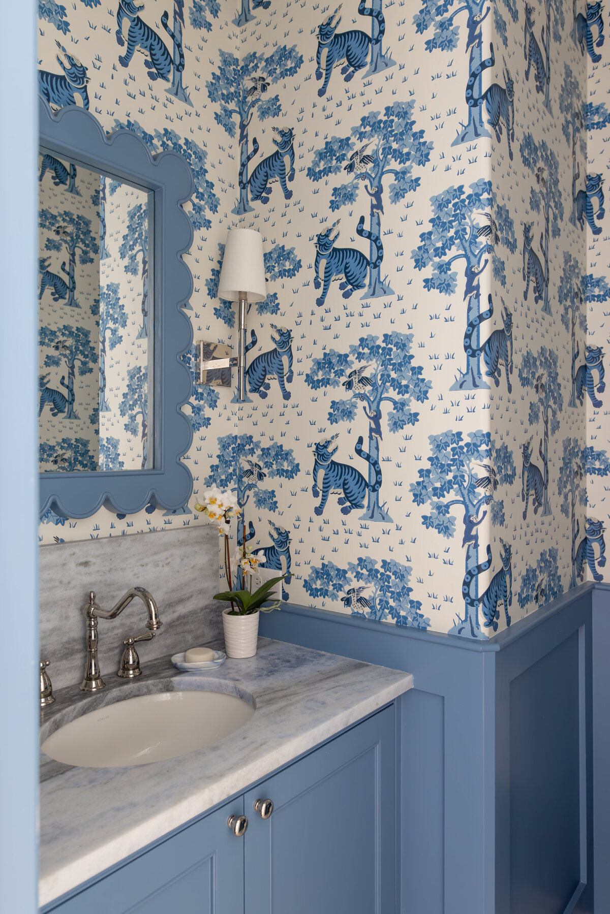 kyleen bushroe interiors blue and white decorative wallpaper powder room