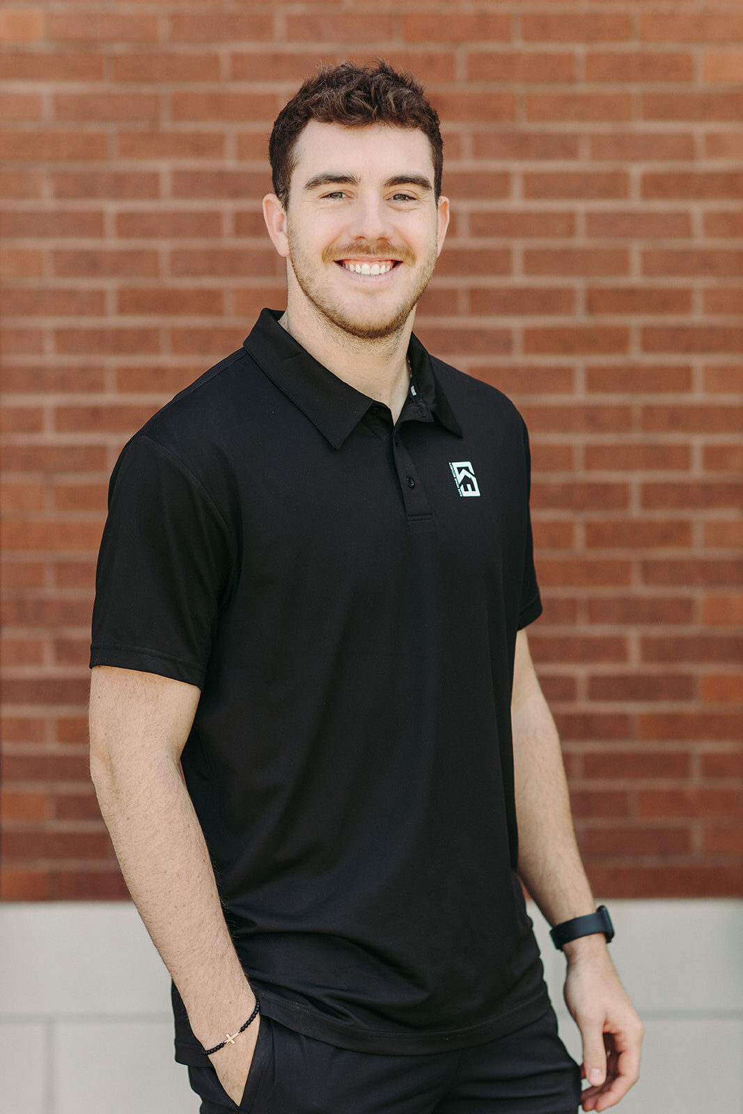 Utah Family Photographer captures man smiling wearing black shirt during brand photography session