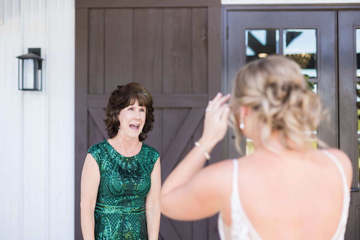 Brides first look with mom at  The Barn at White Oaks, Murray, Kentucky