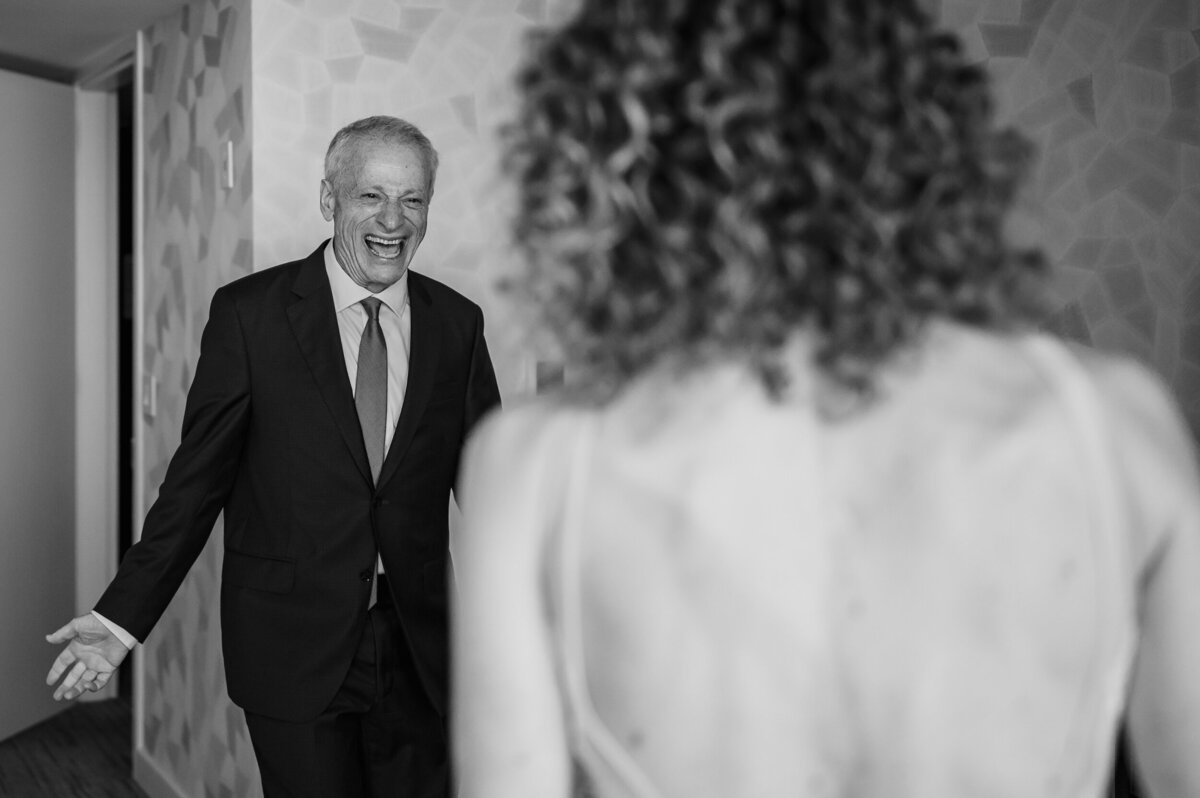 Father of the groom scream in excited during the first look with the bride