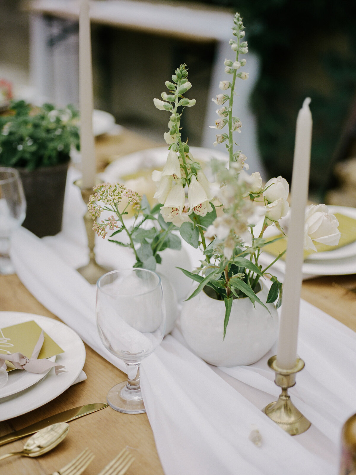 flowers and reception table design at greenhouse wedding in west Michigan