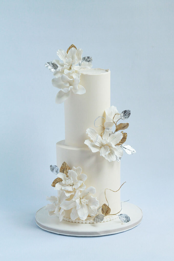 two tier white wedding cake with flowers, Hamilton ON wedding cakes