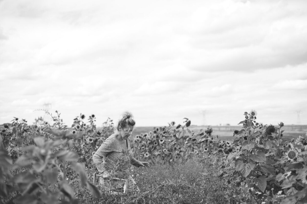 black and white image of women in a wild garden