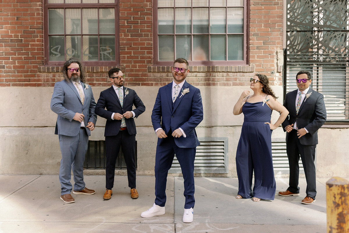 Groom's Party poses in blue and grey on the wedding day.