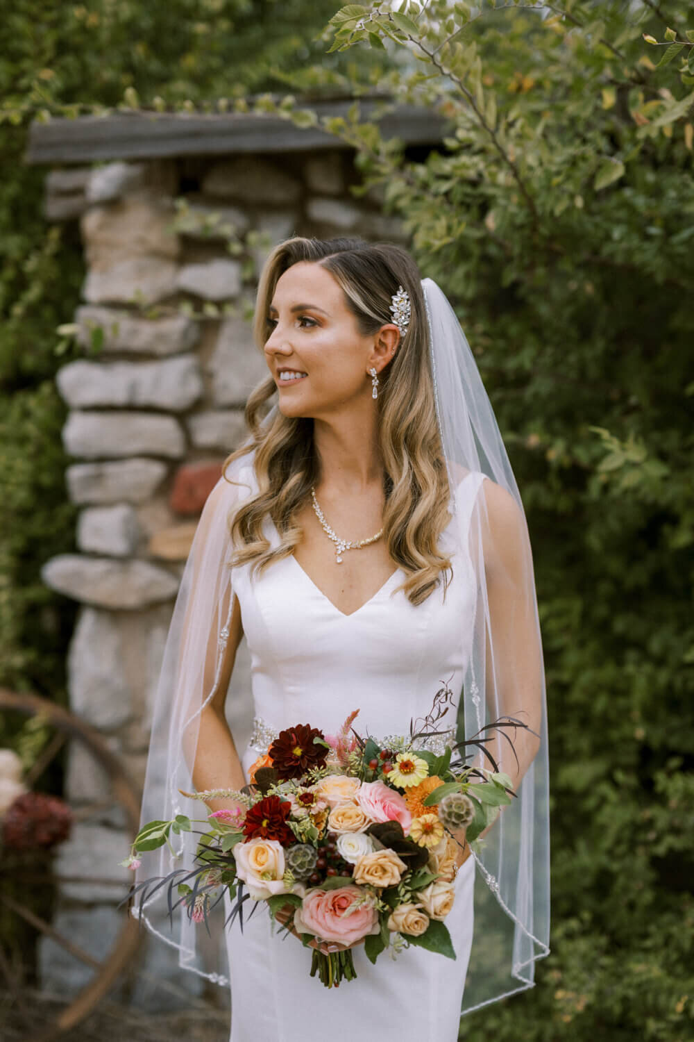 portrait-of-bride-in-front-of-old-stone-building