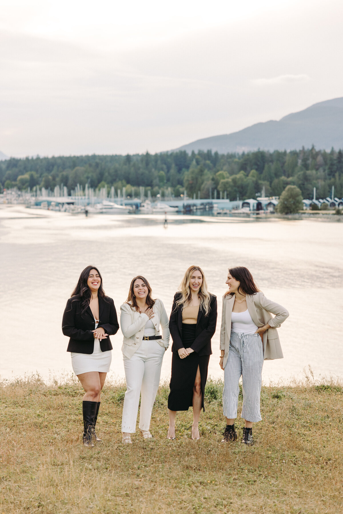 Utah Family Photographer captures team of women walking together and laughing during brand photos