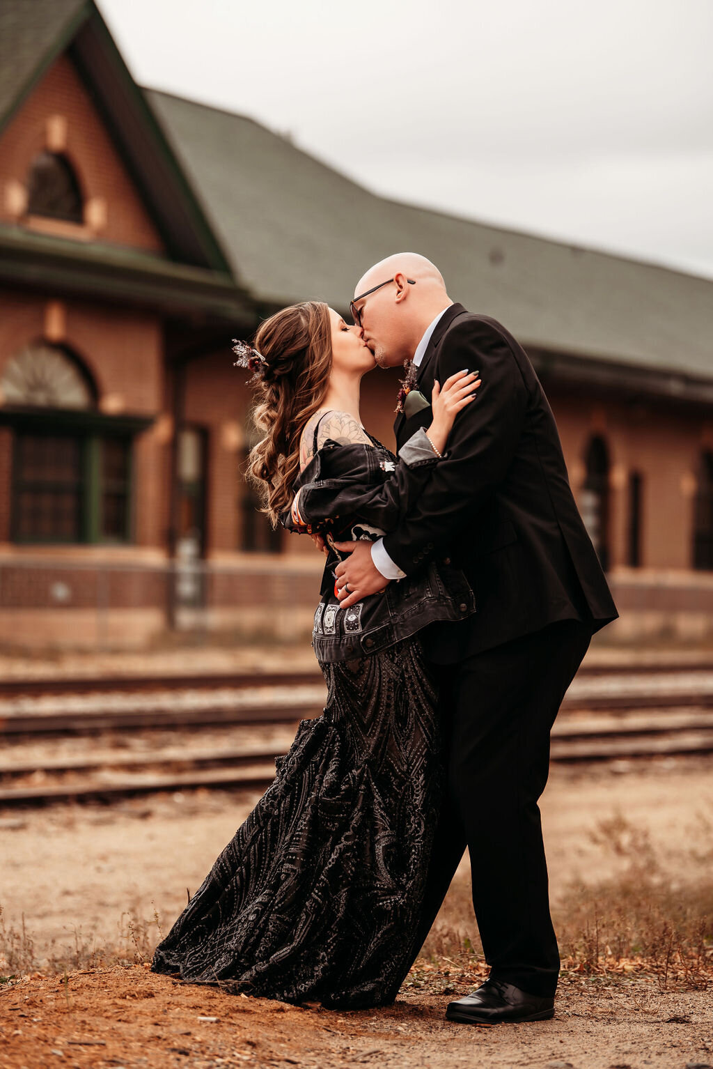 Vesper-and-Vow-Bemidji-Minnesota-wedding-and-elopement-photographer-coordinator-planner-dark-jacket-black-wedding-dress-portrait