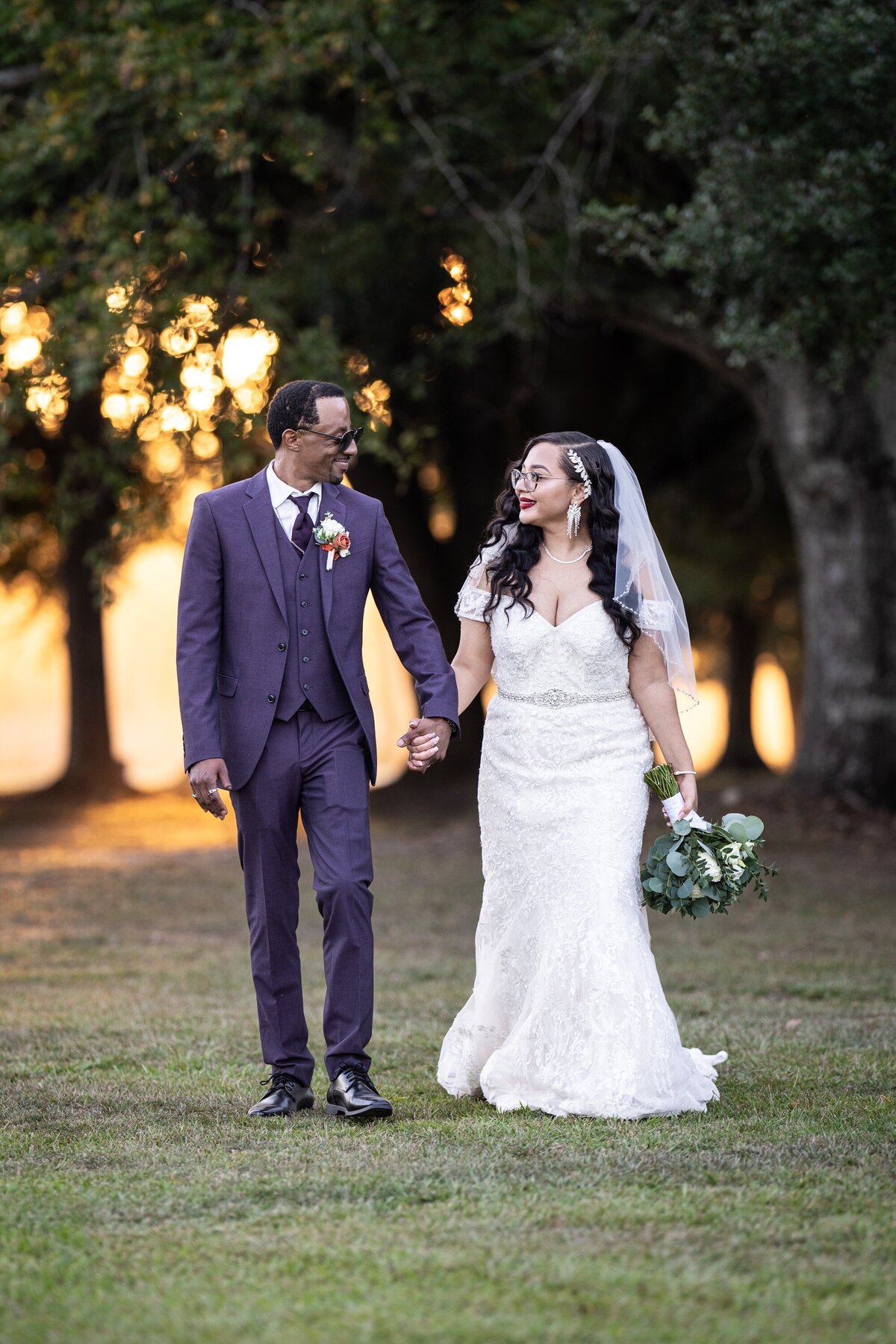 Bride and groom walking at Norris Oaks wedding