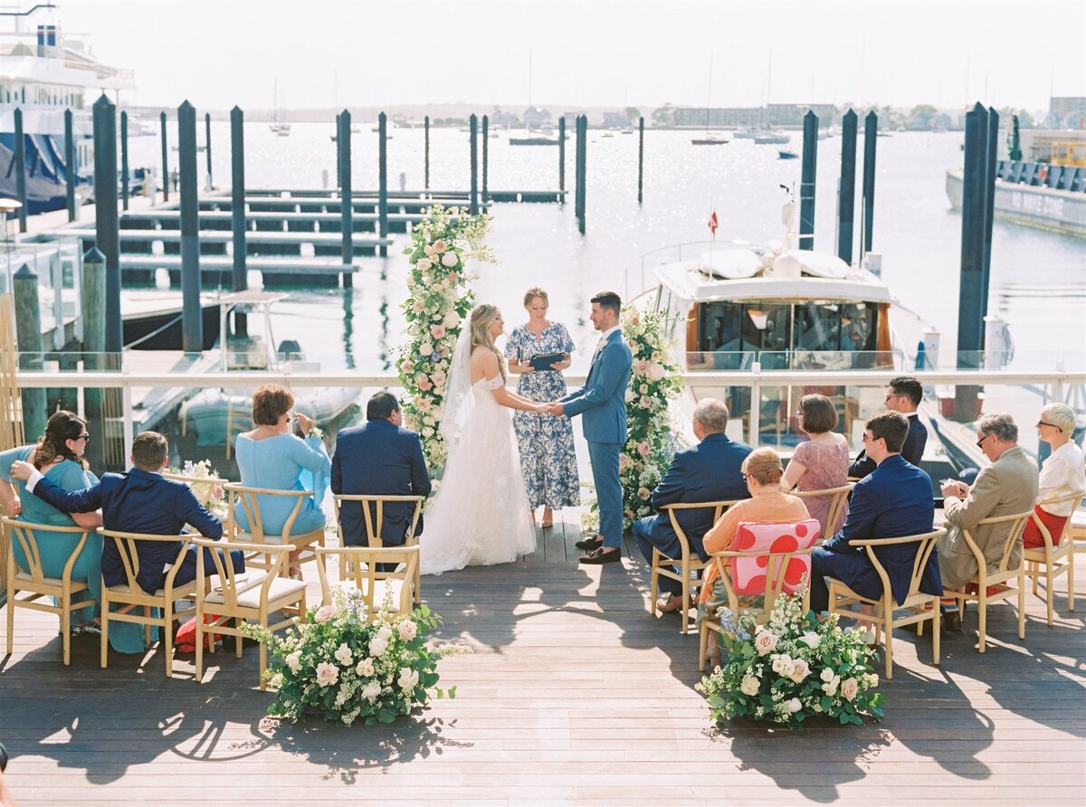 Kate-Murtaugh-Events-wedding-planner-Newport-ceremony-floral-arch-boat-dock-harbor-micro-wedding
