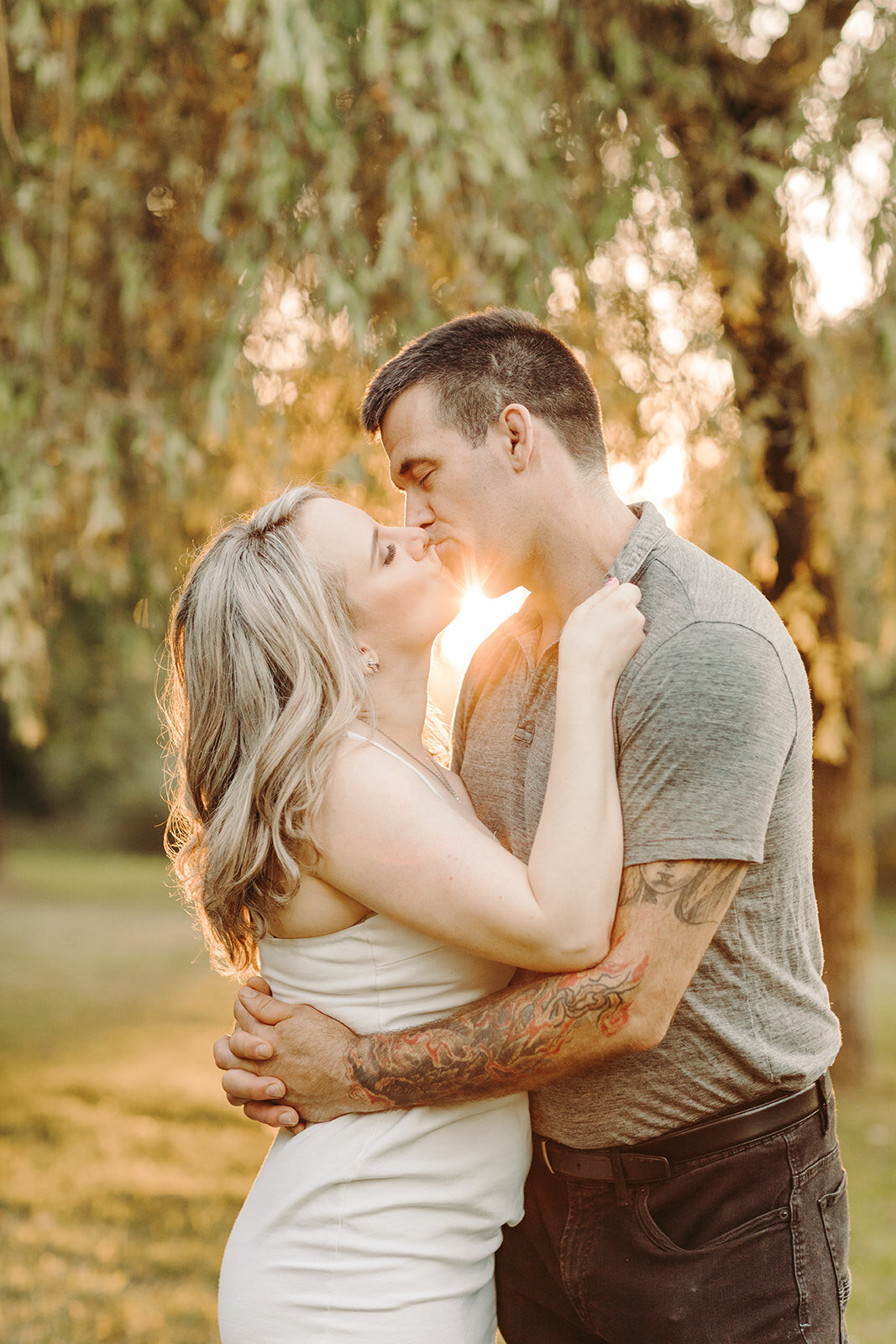 Utah Wedding Photography capturing man and woman kissing during engagement photos
