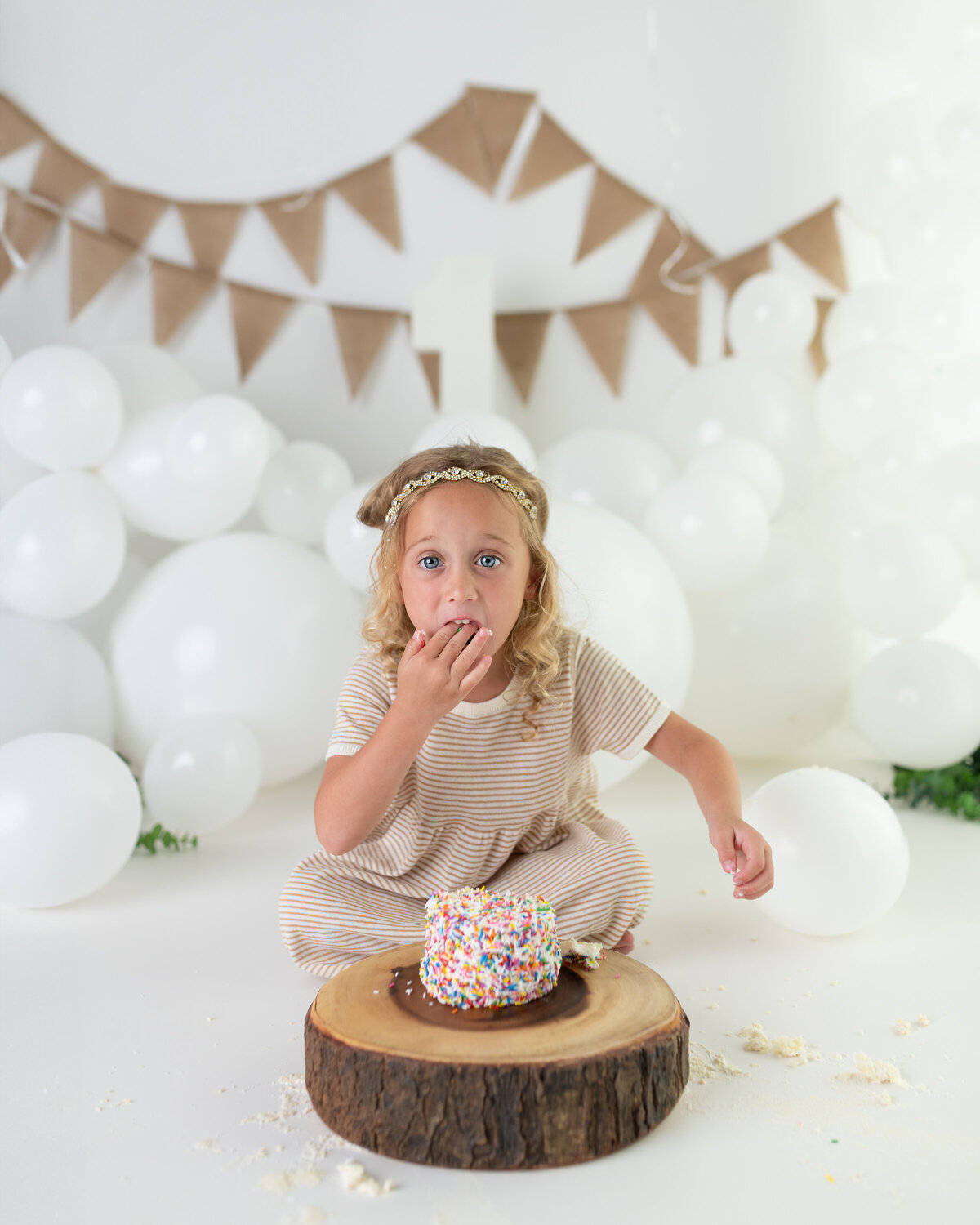 milestone-girl-eating-cake-sprinkles-birthday-photo-paris-ontario