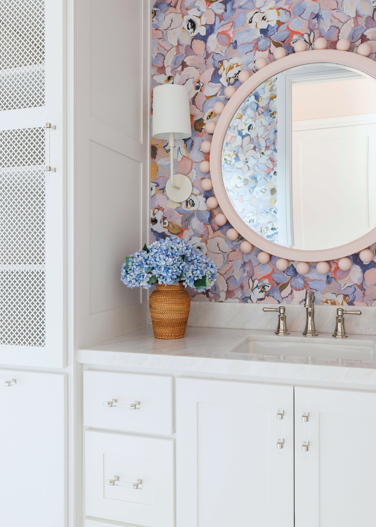 oyster creek studios hughes abstract painted floral wallpaper with gold accent mirror in bathroom 