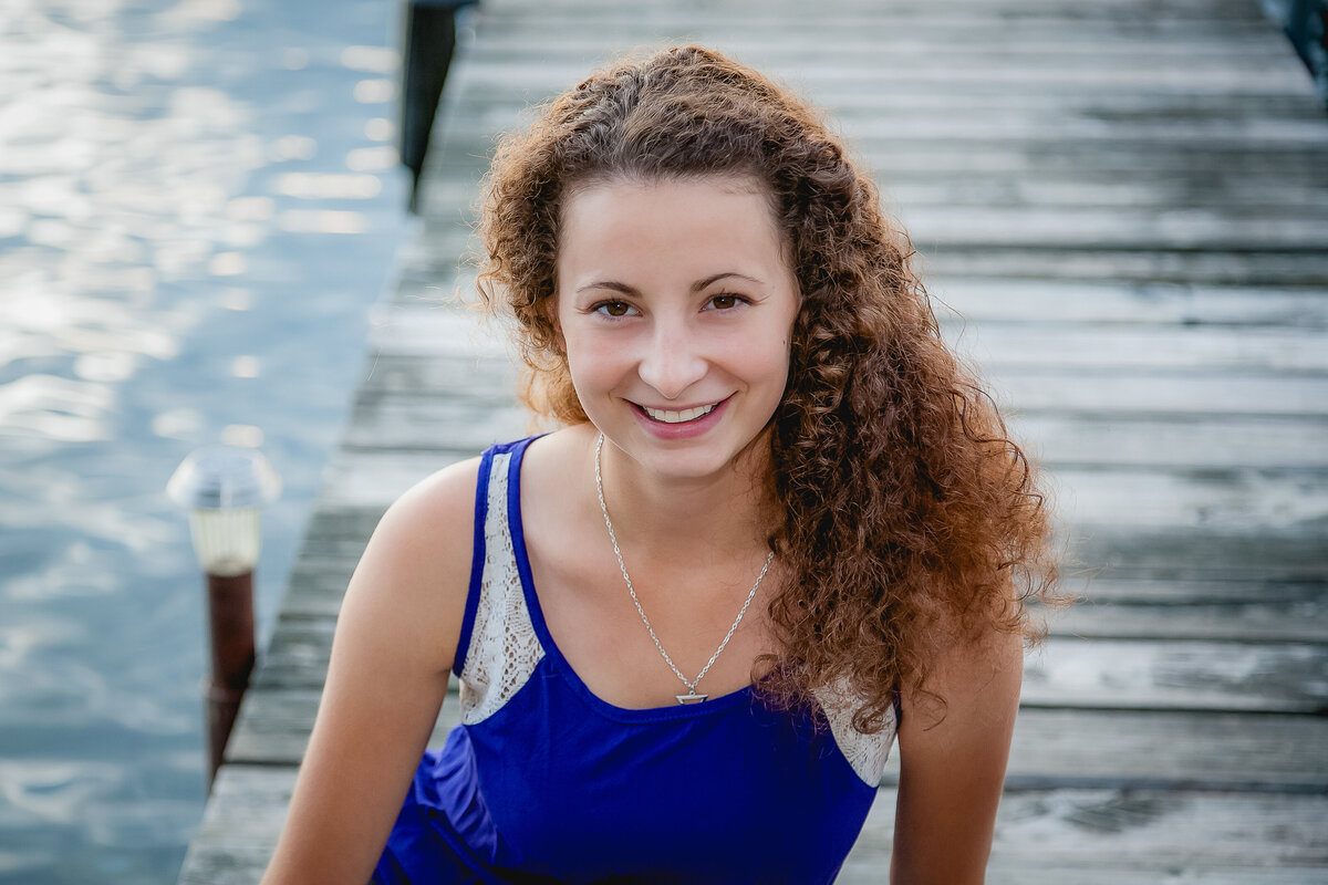 Senior photos on a dock at Keuka Lake