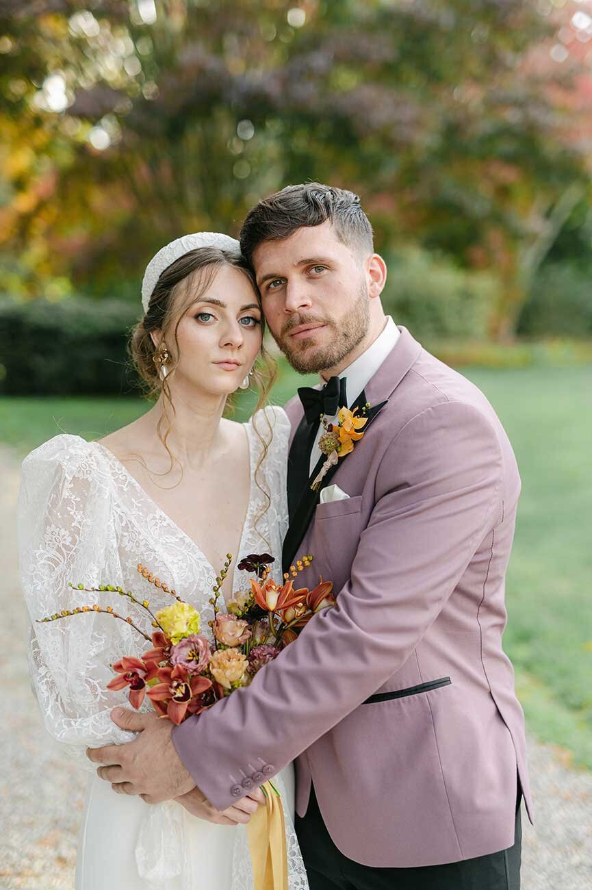 CT Bride and Groom in Purple Suit and lace wedding dress