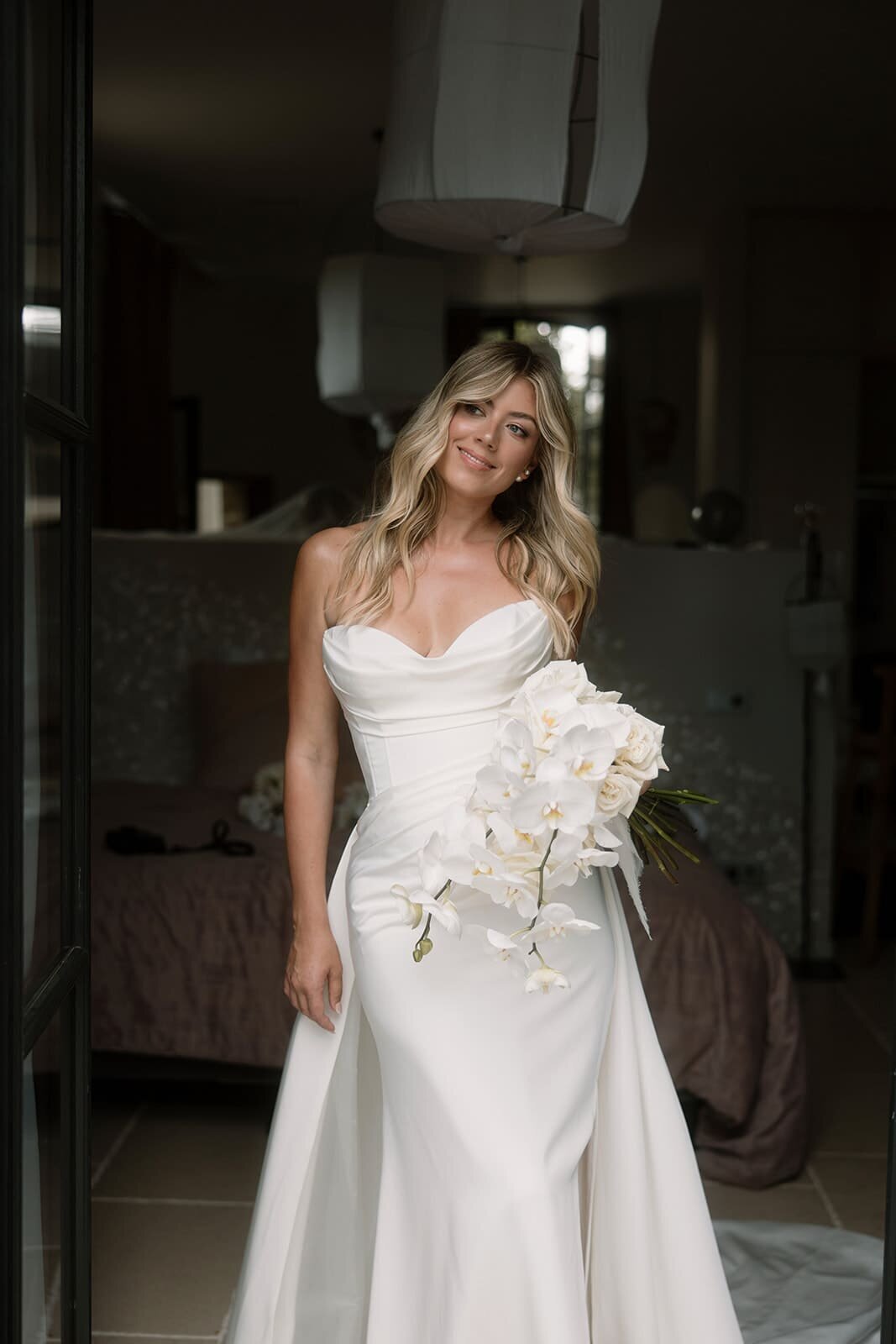 classy-bride-with-orchid-bouquet