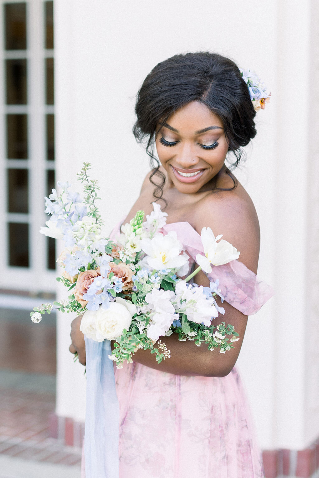 bride with bridal bouquet at villa montalvo saratoga wedding venue and floral haircomb