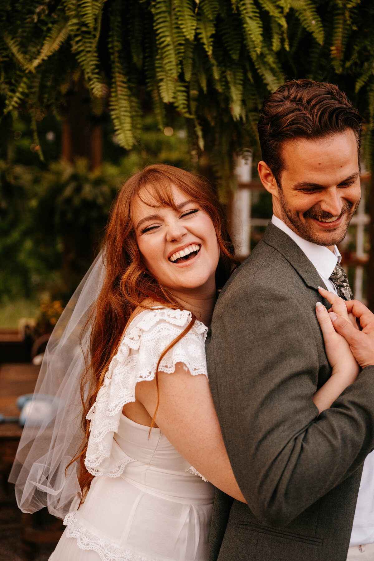 Bride, hugging groom from behind Styled shoot turned elopement at The Greenhouse on Strawberry Lane | Nova Scotia