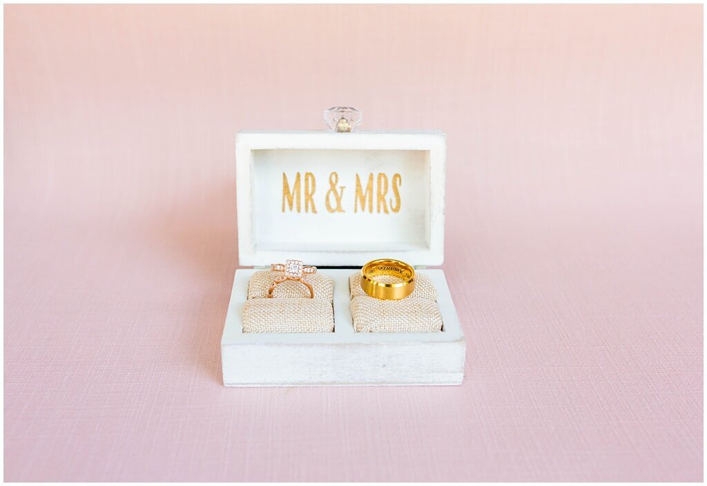 Mr. and Mrs. ring box with rose gold engagement rings