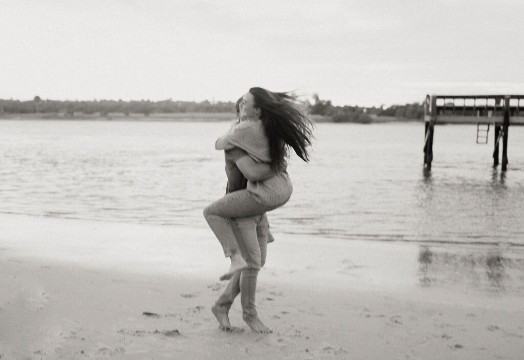 Couple hugging on the beach