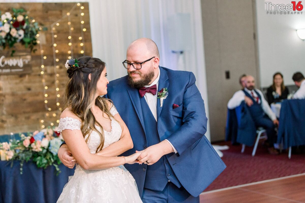 Bride and Groom start their first dance together