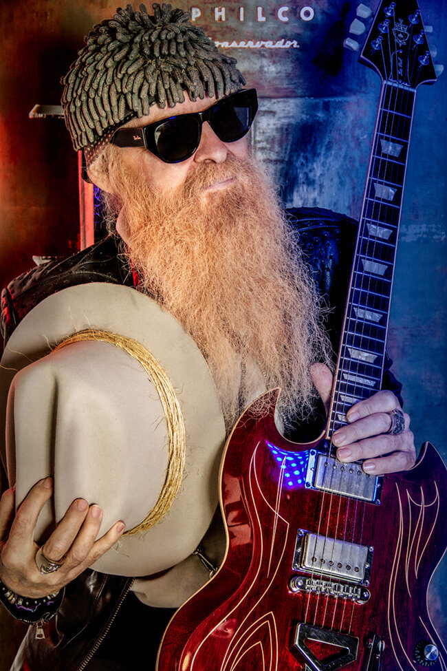 Billy F Gibbons portrait close up wearing hat and sunglasses guitar neck next to his face Just Play Something Gallery