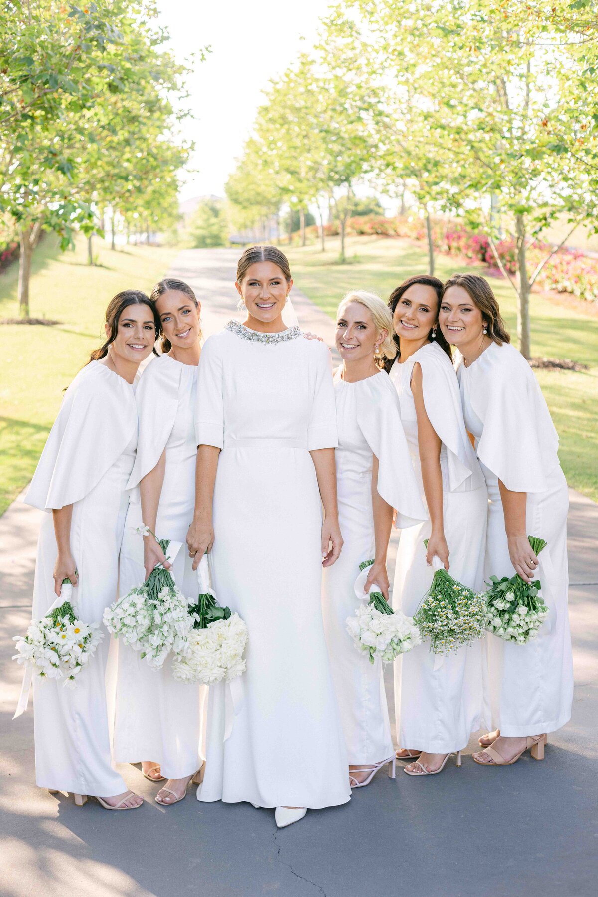 bride with her bridesmaids